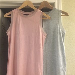 2 sleeveless shirts
